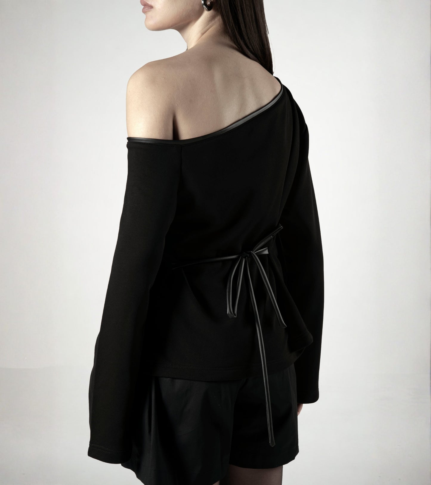 Asymmetrical multi-wear top